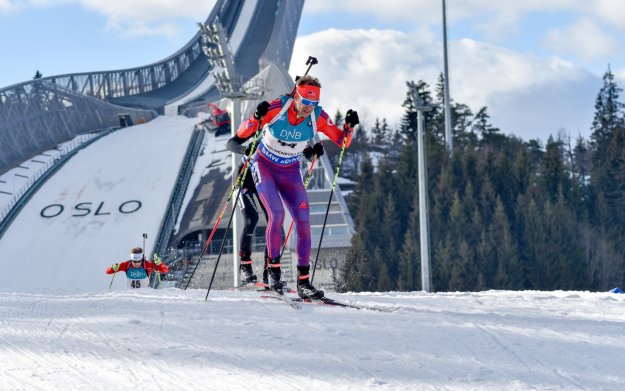 C over Image of Lowell Bailey USA competing in the biathlon pursuit race at - photo 1