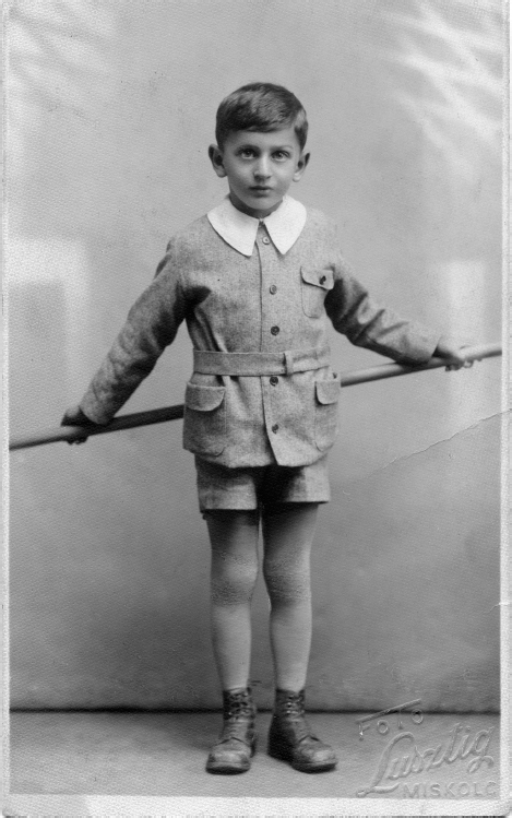 George age five holding a broom behind his back The idea of holding the - photo 3