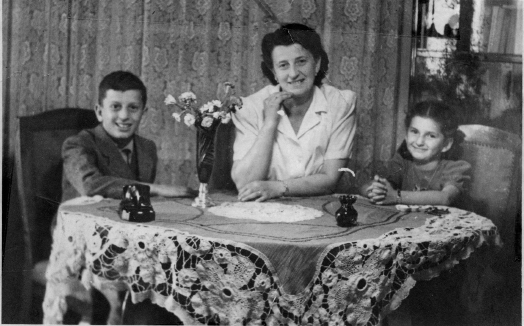 George age ten with his mother and his sister Marika in the dining room of - photo 5