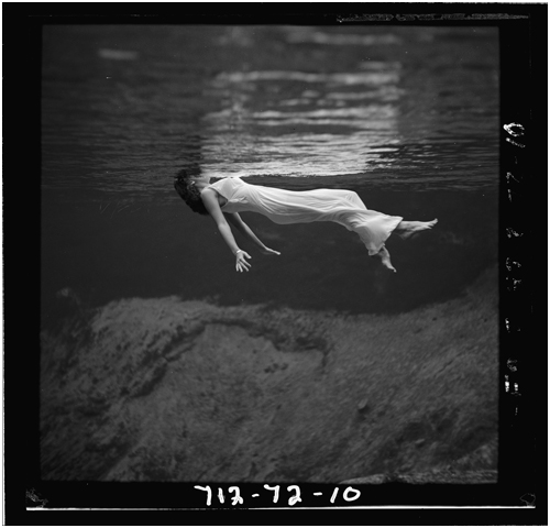 A woman floats in the crystal clear waters of Weeki Wachee Springs 1947 - photo 3