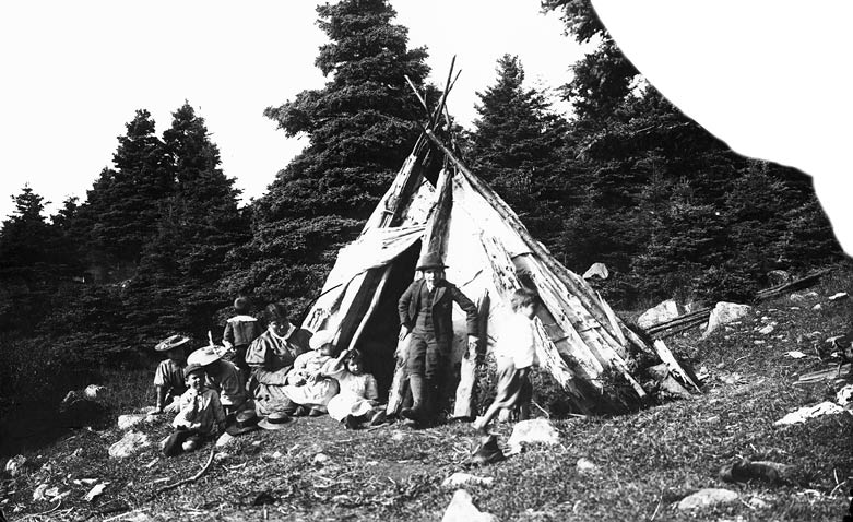 A Mikmaw family is shown in front of a wigwam in this photograph dated ca - photo 4