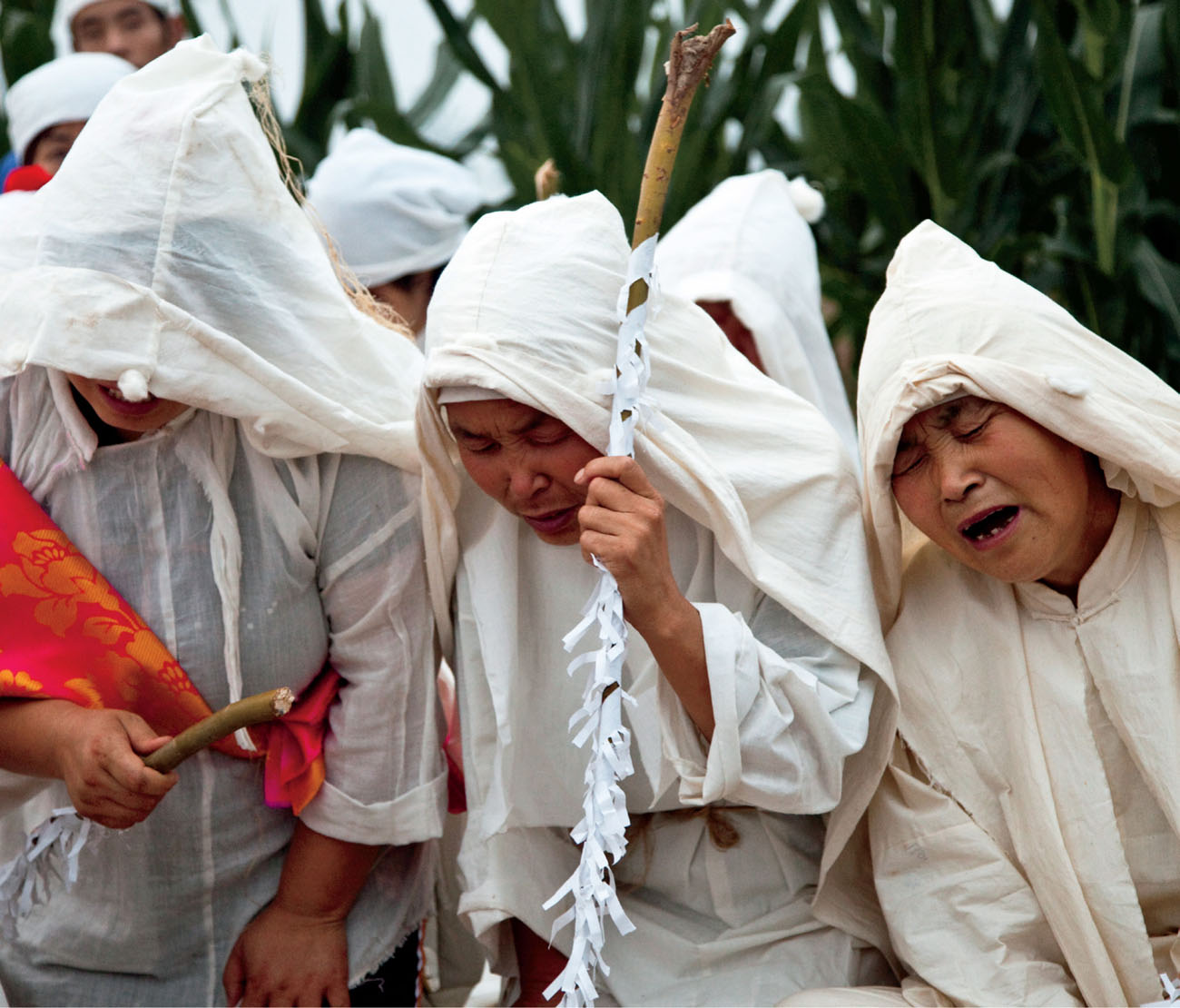 Professional mourners join the procession at a Chinese funeral PAID TO MOURN - photo 14