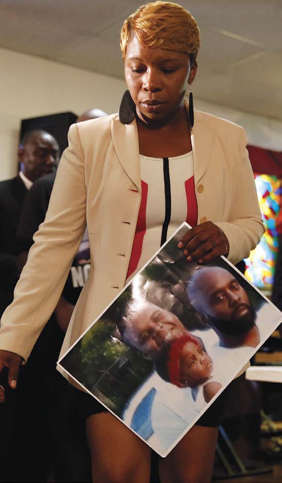 Michael Browns mother Lesley McSpadden at a news conference in Jennings - photo 4