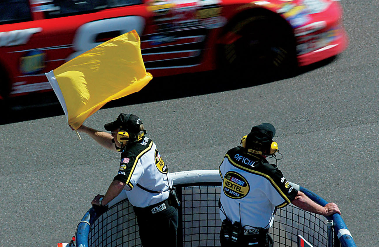 Yellow flags are waved when there is an accident on the trackYou may not be a - photo 3