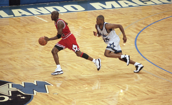 Image Credit AP ImagesBrian Cleary Ball in hand Michael Jordan dribbles up - photo 2