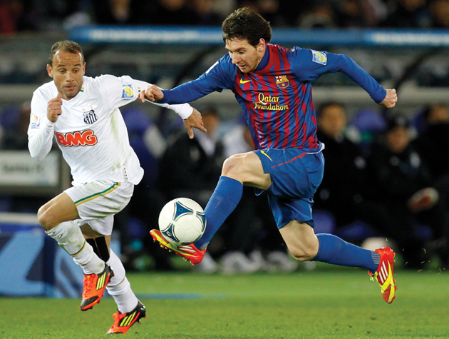 Image Credit AP ImagesShuji Kajiyama Messi dribbles past a defender from - photo 5