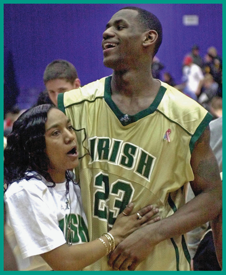 LeBrons mom Gloria gives him a hug after a big high school game in February - photo 3