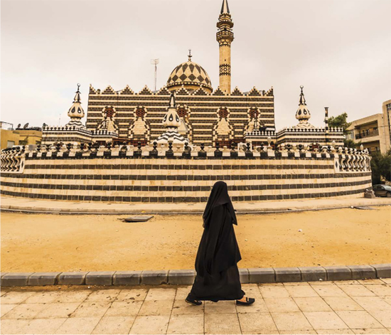 A veiled woman walks before the Abu Darweesh Mosque in Amman Jordan Mosques - photo 4