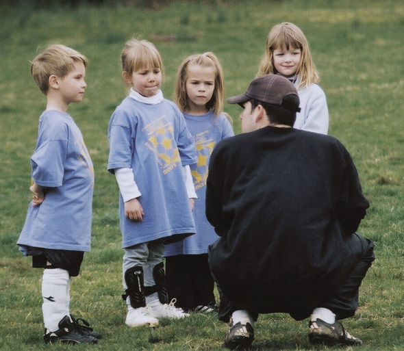 Before we start practicing Coach Brian talks to us about teamwork Soccer - photo 14