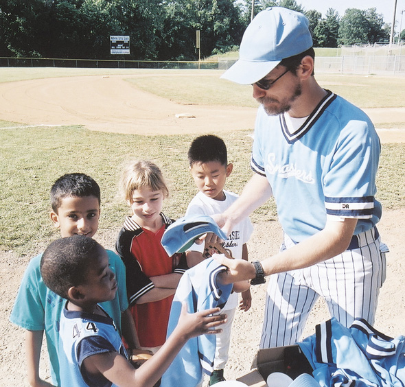 At our first practice Coach Pat gives out jerseys with our teams name on them - photo 7