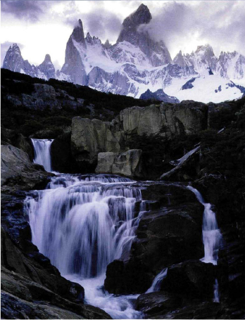 Mt Fitz Roy looms over a waterfall in Los Glaciers National Park in the Santa - photo 4
