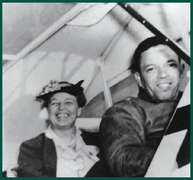 A delighted Eleanor Roosevelt enjoys her ride through the sky with pilot - photo 4