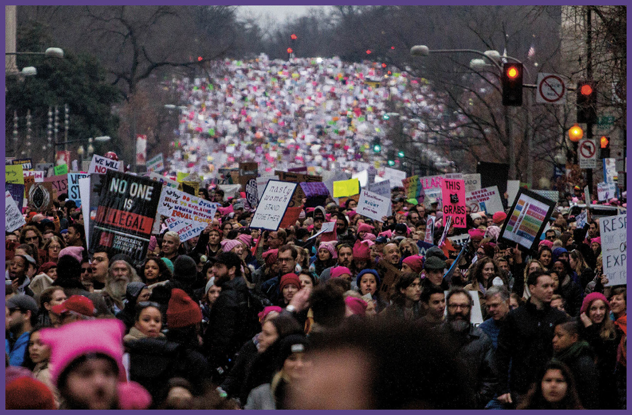 People marched in Washington DC during the Womens March Standing Up in - photo 7