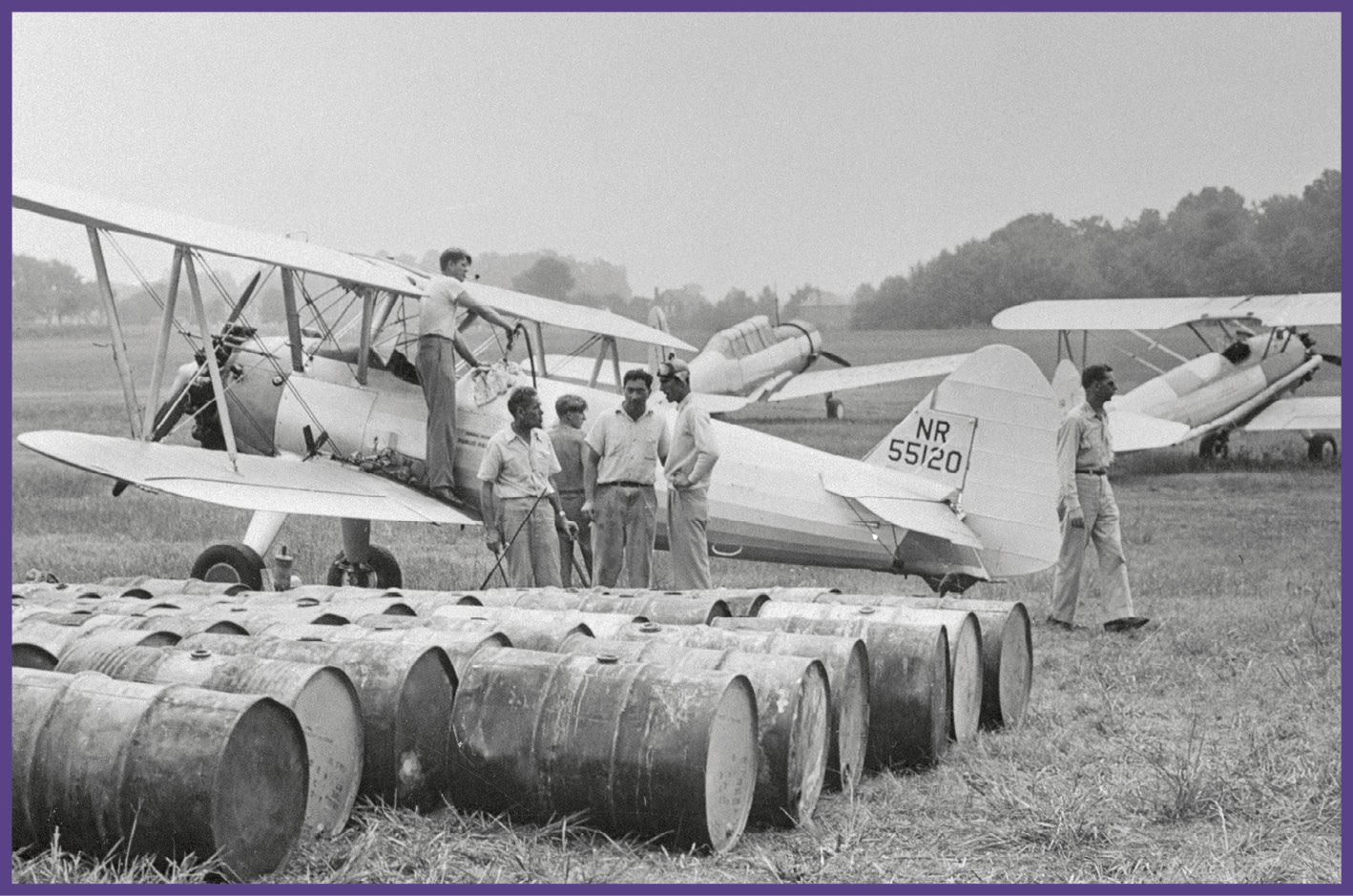 A plane crew waited in a field to spray barrels of DDT in 1947 The DDT was - photo 13