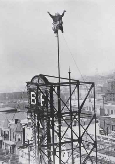 Alvin Shipwreck Kelly sits atop a pole over the B F Keith Theater in Union - photo 6