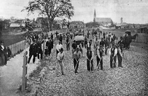 Workmen construct Washington Street while admiring citizens look on Somerville - photo 4