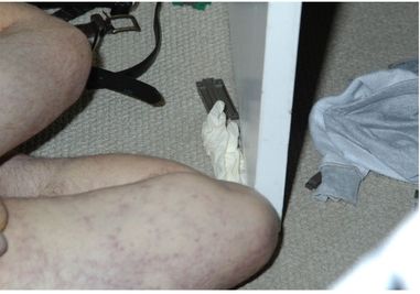 The murderer left a latex glove in the closet next to Jim Cannons knee - photo 13