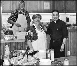 Daniel and Deborah Slavinskas take the GBM message to heart by helping to cook - photo 3