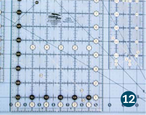 Match the Lines Place a ruler on the gridded side of your cutting mat If the - photo 11