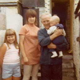 Me aged eighteen with my cousin and my grandad who is holding Dennis - photo 6