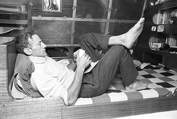 Moitessier poses on his bunk during the weeks preparing in Plymouth - photo 12