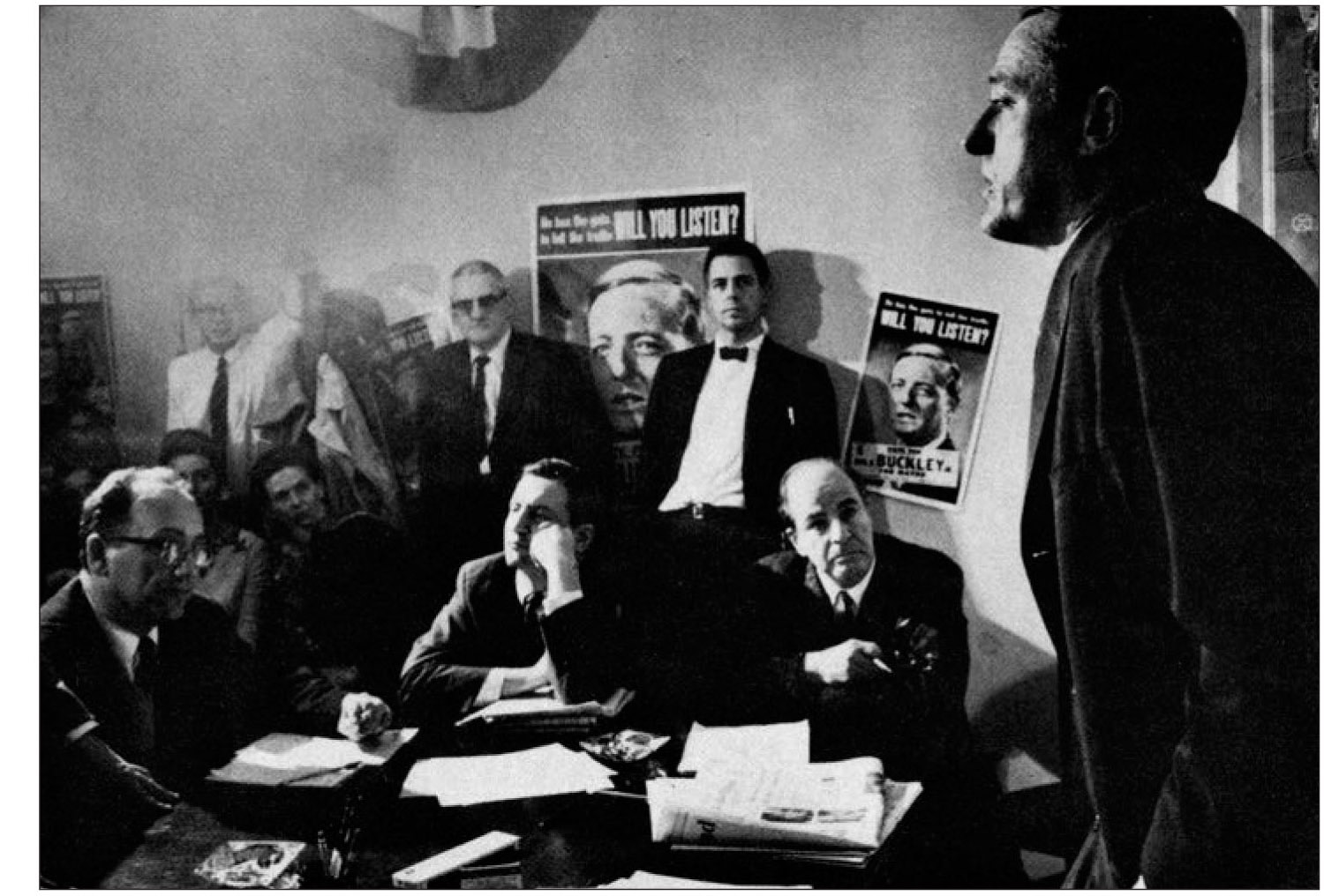 Kieran ODoherty center sitting James Buckley standing between posters - photo 8