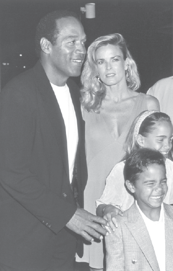 OJ Simpson is shown with his ex-wife Nicole and their children on March 16 - photo 4