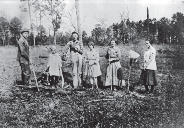 A typical Ozark family with field-clearing tools Rogers Historical Museum - photo 3