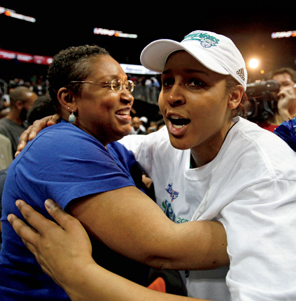 Maya hugs her mom after a game in 2011 As a kid Maya was always in motion To - photo 5