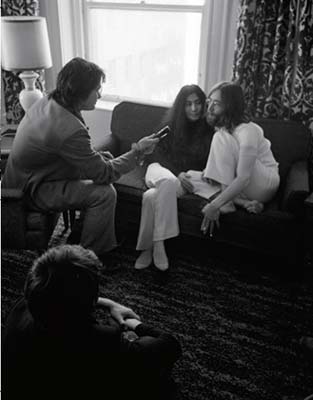 John and Yoko being interviewed I had just snuck into their room Thats the - photo 2