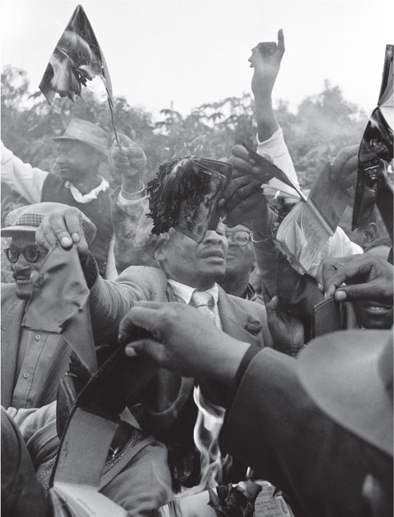 Figure 01 A pass burning demonstration Soweto SA 1961 Magnum Photos Ian - photo 4