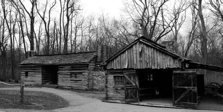 The Kelso-Miller dogtrot-style cabin and the Miller blacksmith shop next door - photo 3