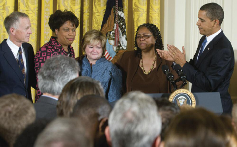 President Barack Obama applauds the sisters of James Byrd Jr and the parents - photo 3