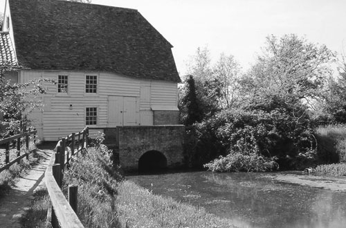 The old watermill at Hinxton Duxford is divided by the A505 and on the far - photo 1