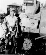 Dad posed with the combine that shredded his shirt We always kept track of - photo 4