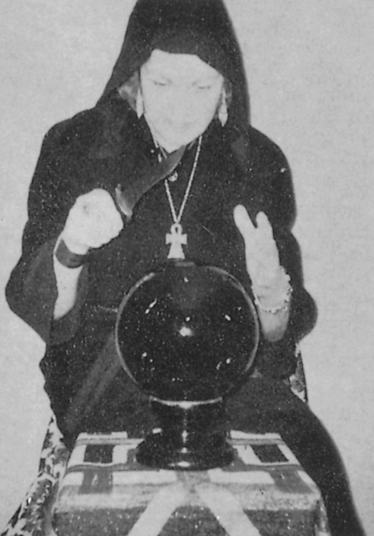 Demonstrating the invocation of power into a glass ball for purposes of - photo 15