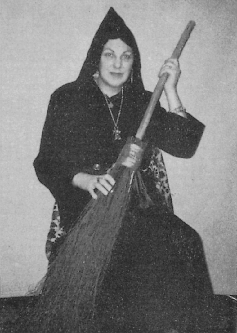 Traditional witch costume of hooded black cloak and broomstick First published - photo 16