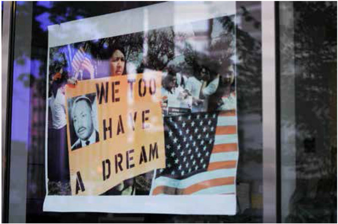 Washington USA July 8 2011 The reflection of demonstrators on a window - photo 1