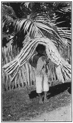 Plate I Boy carrying a bastos mat Argao Cebu Another use of mats is in the - photo 5