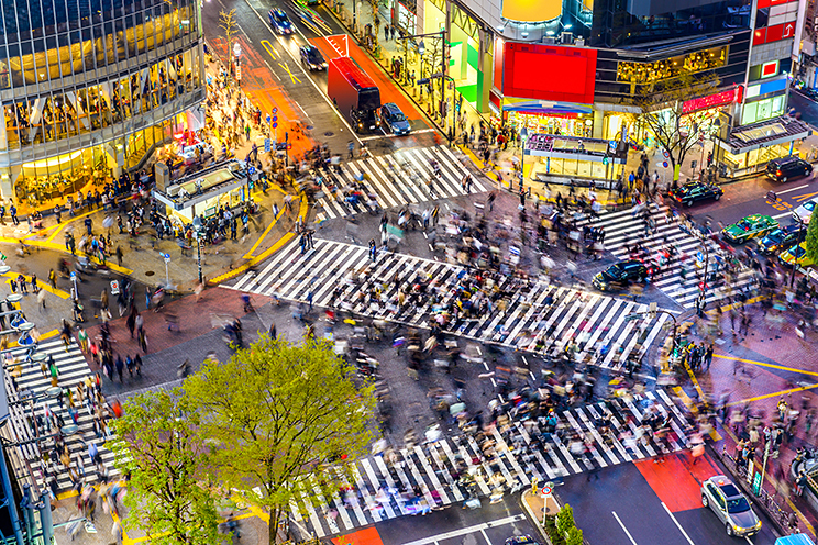 Shibuya Crossing SEAN PAVONESHUTTERSTOCK Shinjuku Nightlife Shinjuku is - photo 11