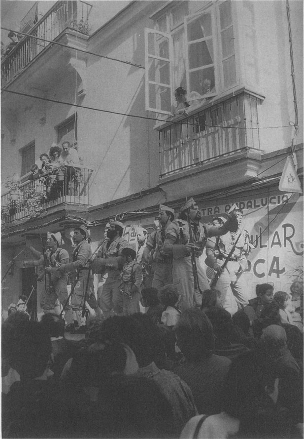 A carnival group sings its repertoire on a Cadiz street A carnival - photo 2