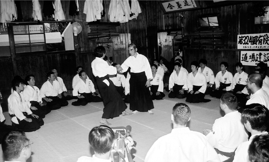 The author explaining kokyu ryoku or breath power at the monthly yudansha - photo 11