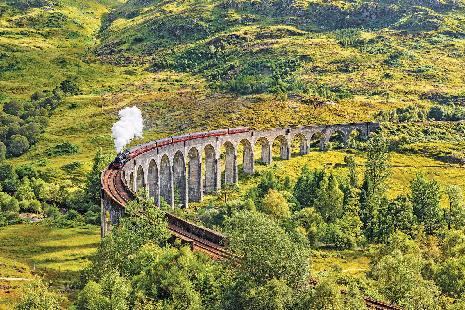 Riding the over the iconic Glenfinnan Viaduct and catching a glimpse of the - photo 20