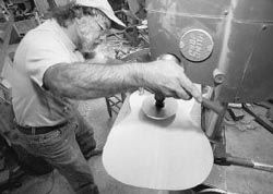 Cutting the soundhole from the spruce top Rosewood guitar sides with the - photo 10