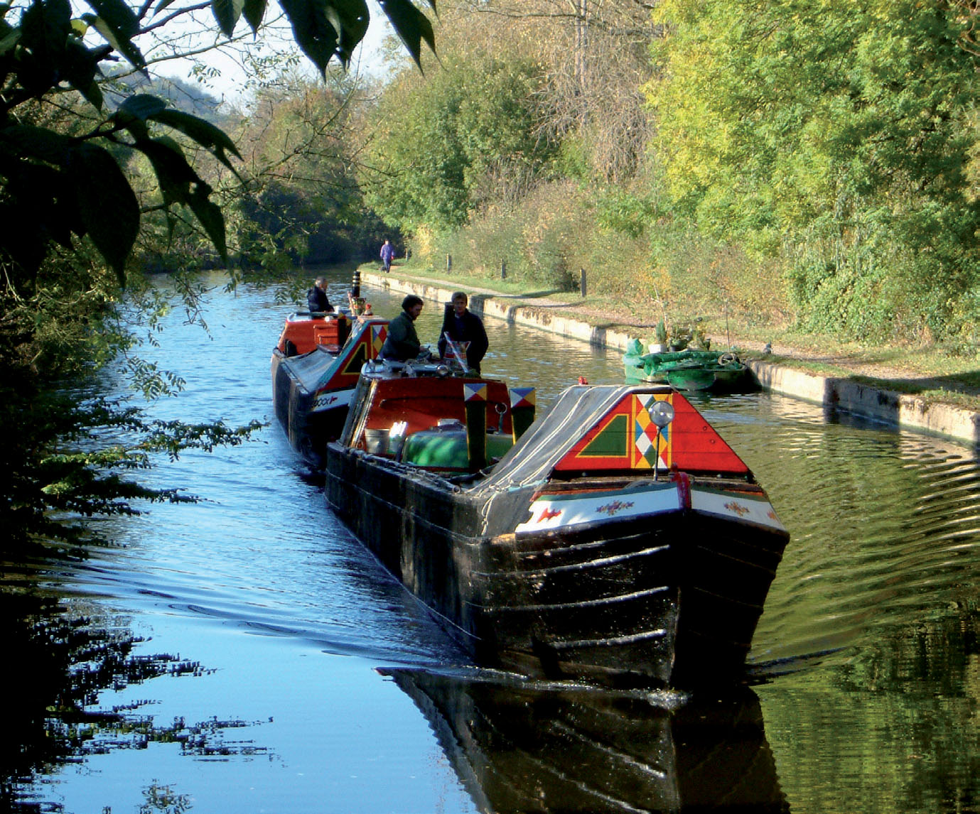 A pair of narrow boats carrying coal on the Grand Union Canal The rear boat - photo 3