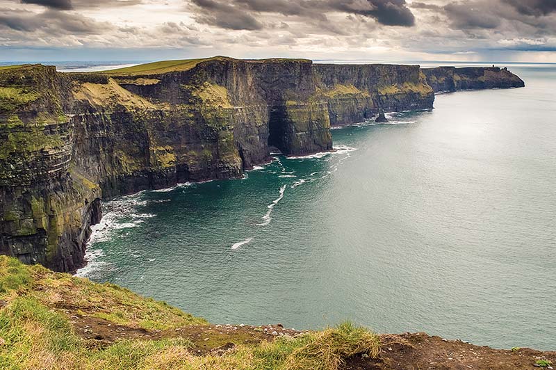 The Cliffs of Moher No postcard can convey the misty magnificence of this - photo 13