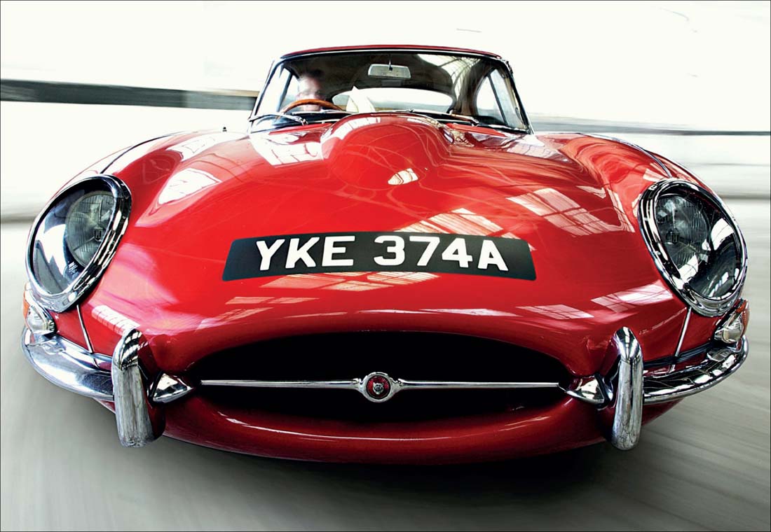 A red E-Type of late 1963 build shows off the amazing face of the Coventry cat - photo 4