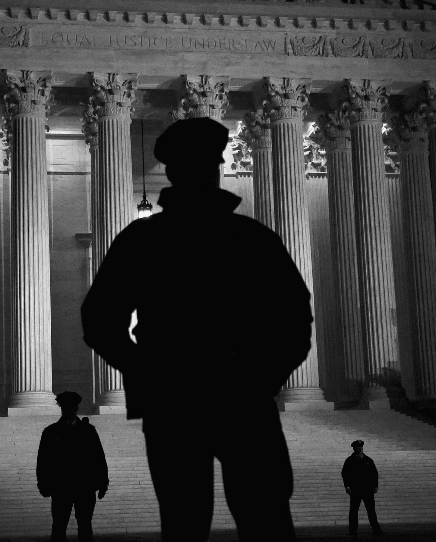 Police stand outside the Supreme Court building in Washington as President - photo 2