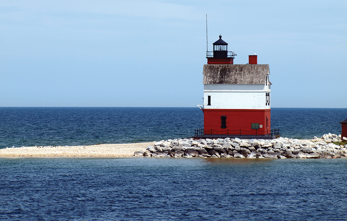 THE ROUND ISLAND LIGHTHOUSE GREETS VISITORS TO MACKINAC ISLAND Each of these - photo 5