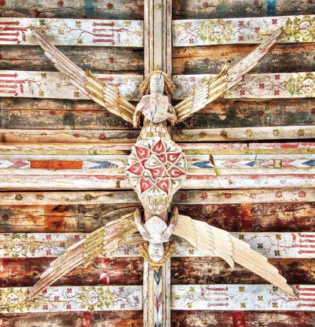 Paired angels on the central beam of the cambered roof at Holy Trinity - photo 5